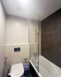 frameless fixed glass panel from bathtub